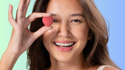 Woman holding Voyage 77 Creatine + Collagen Gummies to demonstrate the benefits of creatine loading vs consistent, smaller doses.